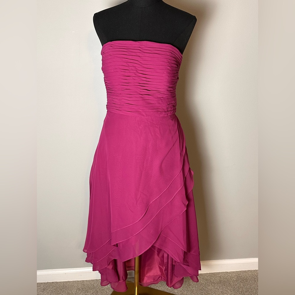 Raspberry evening gown.Never worn.Strapless high low dress. Chiffon pleated top